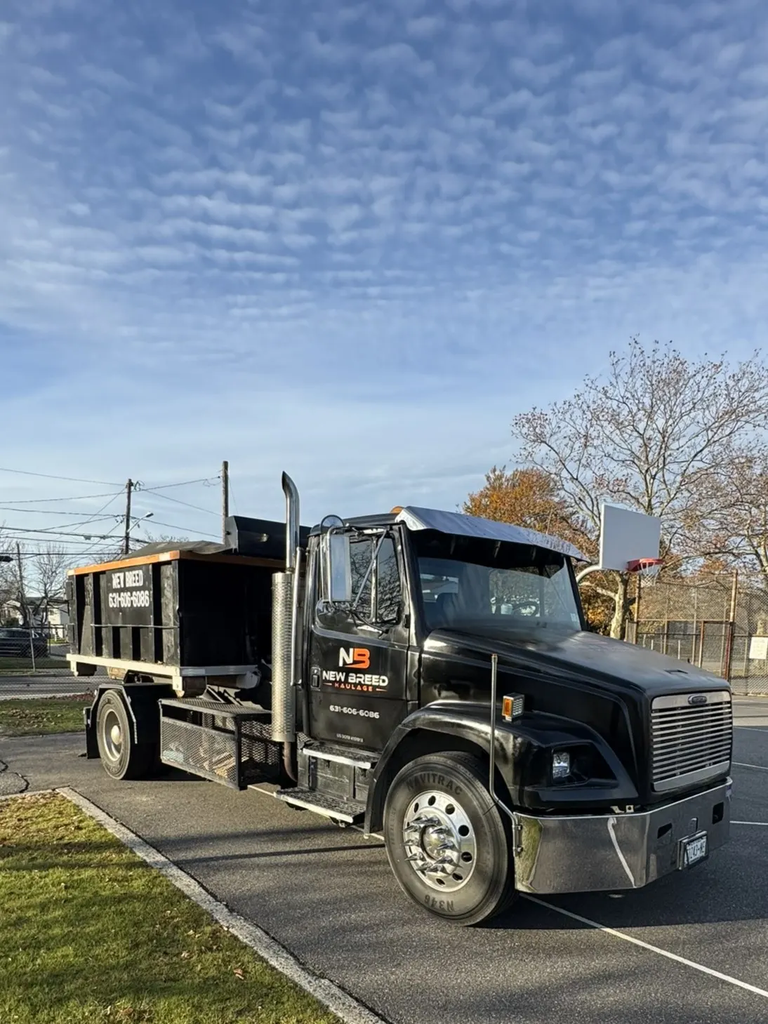 New Breed Haulage cable hoist roll-off truck, Long Island